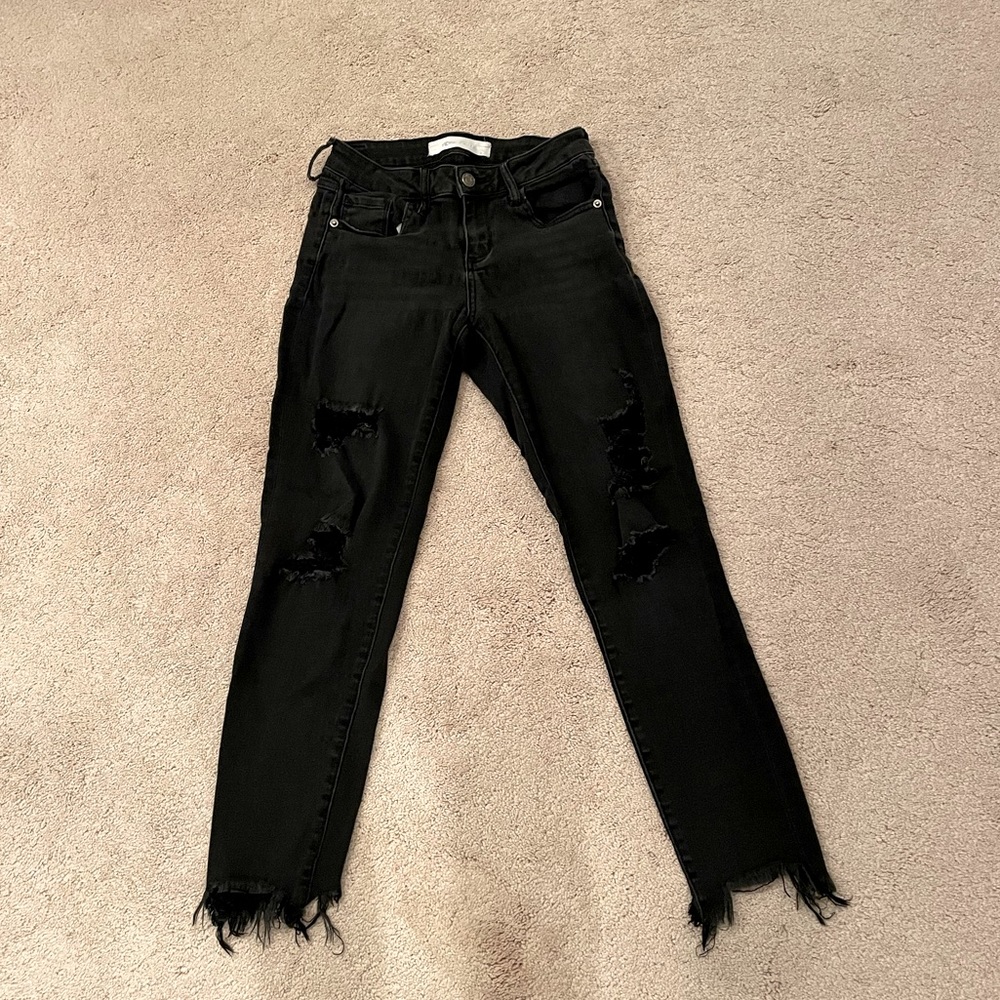 Black cropped ripped skinny jeans
